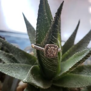 Elegant Silver Ring with Halo Setting and Cushion-Cut Stone